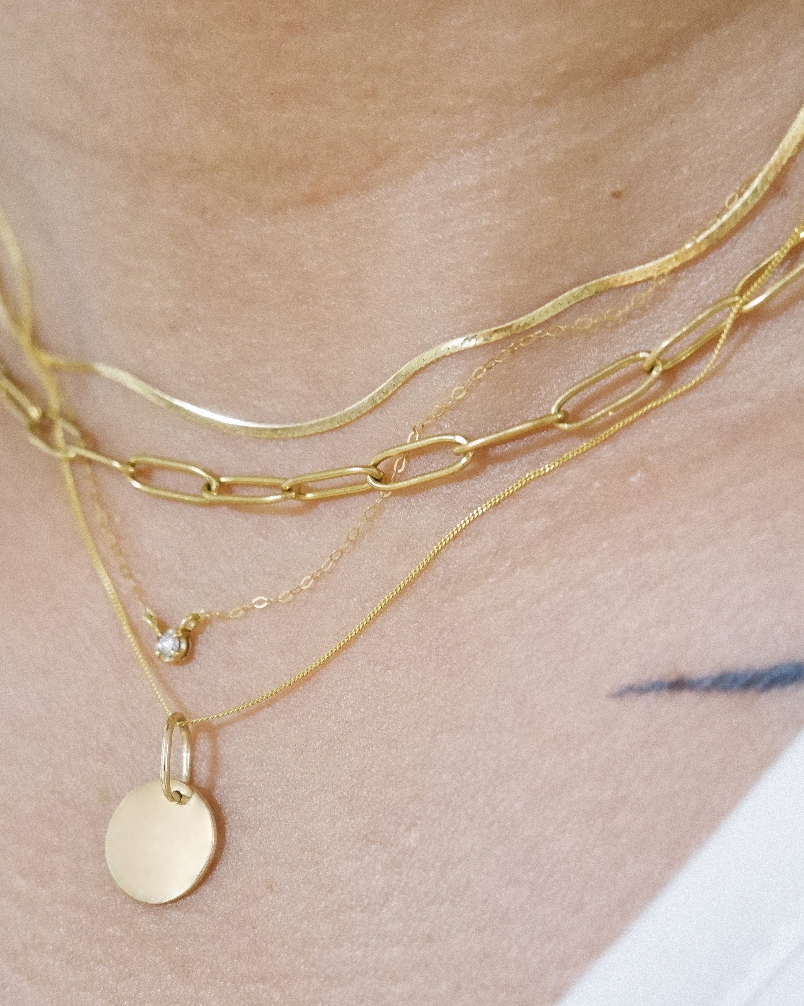 The Tiny Disc Pendant in Solid Gold