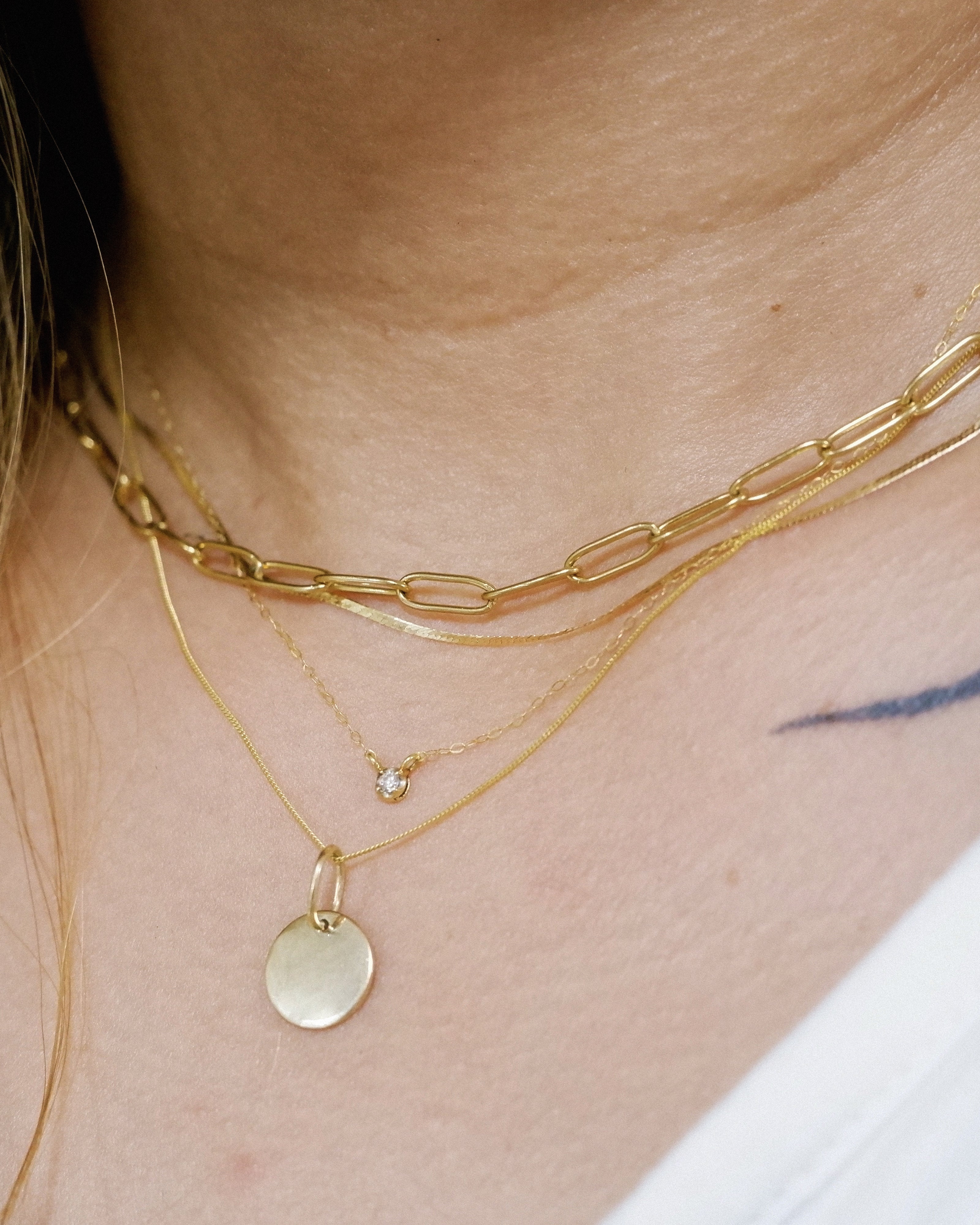 The Tiny Disc Pendant in Solid Gold