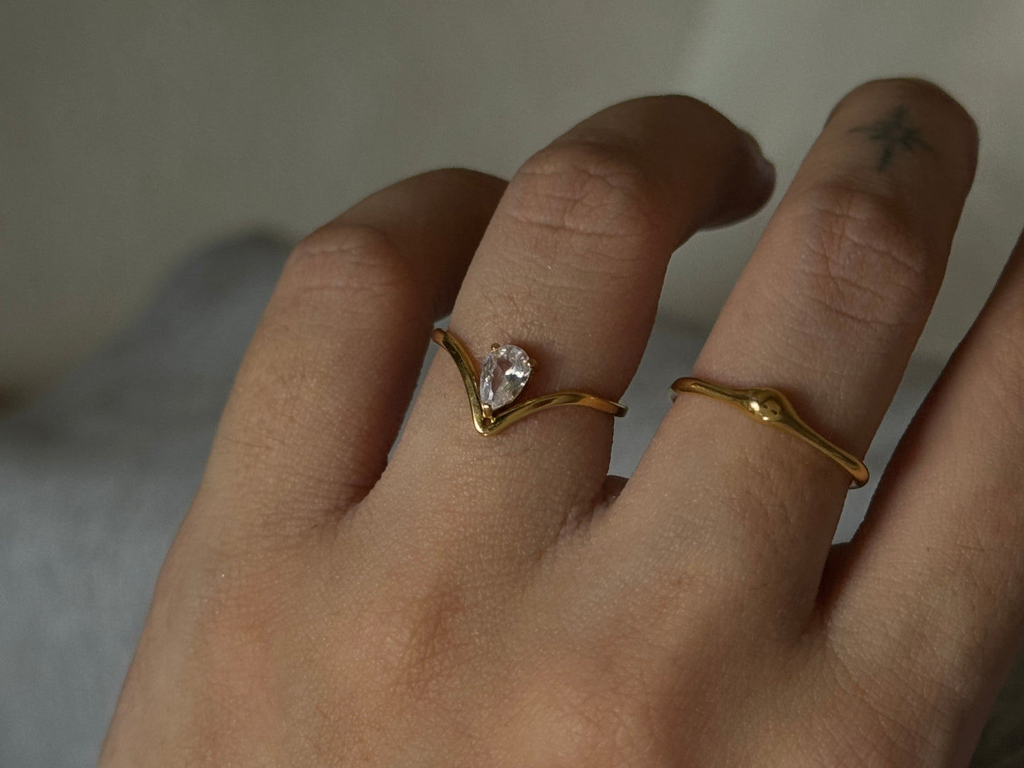 The Ava Floating Pear Moissanite Ring in Solid Gold