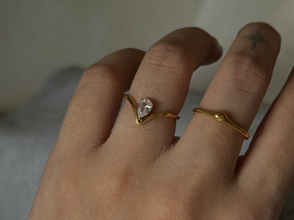 The Ava Floating Pear Moissanite Ring in Solid Gold