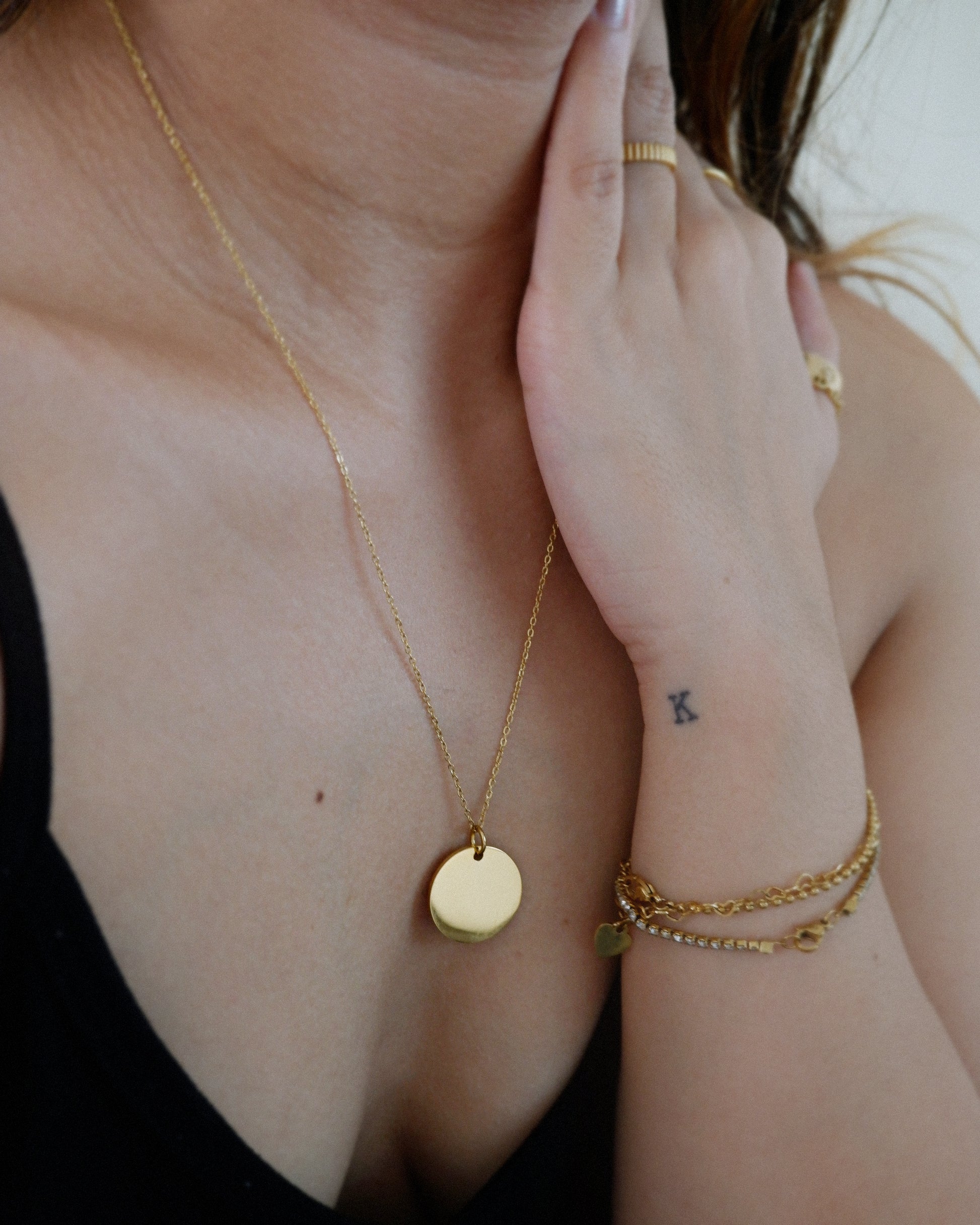 The Tiny Disc Pendant in Solid Gold