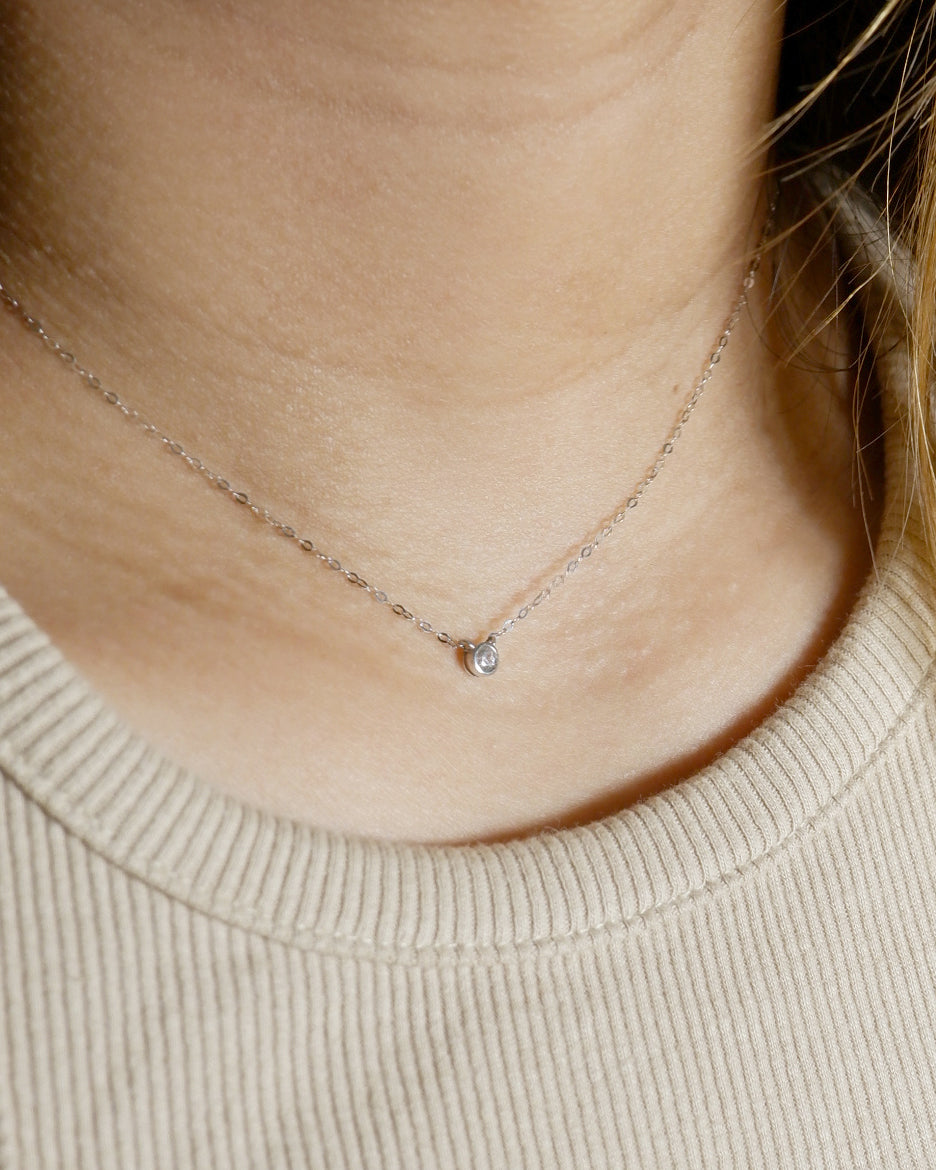 The Tiny Signity Solitaire Necklace in Solid Gold (Rare)