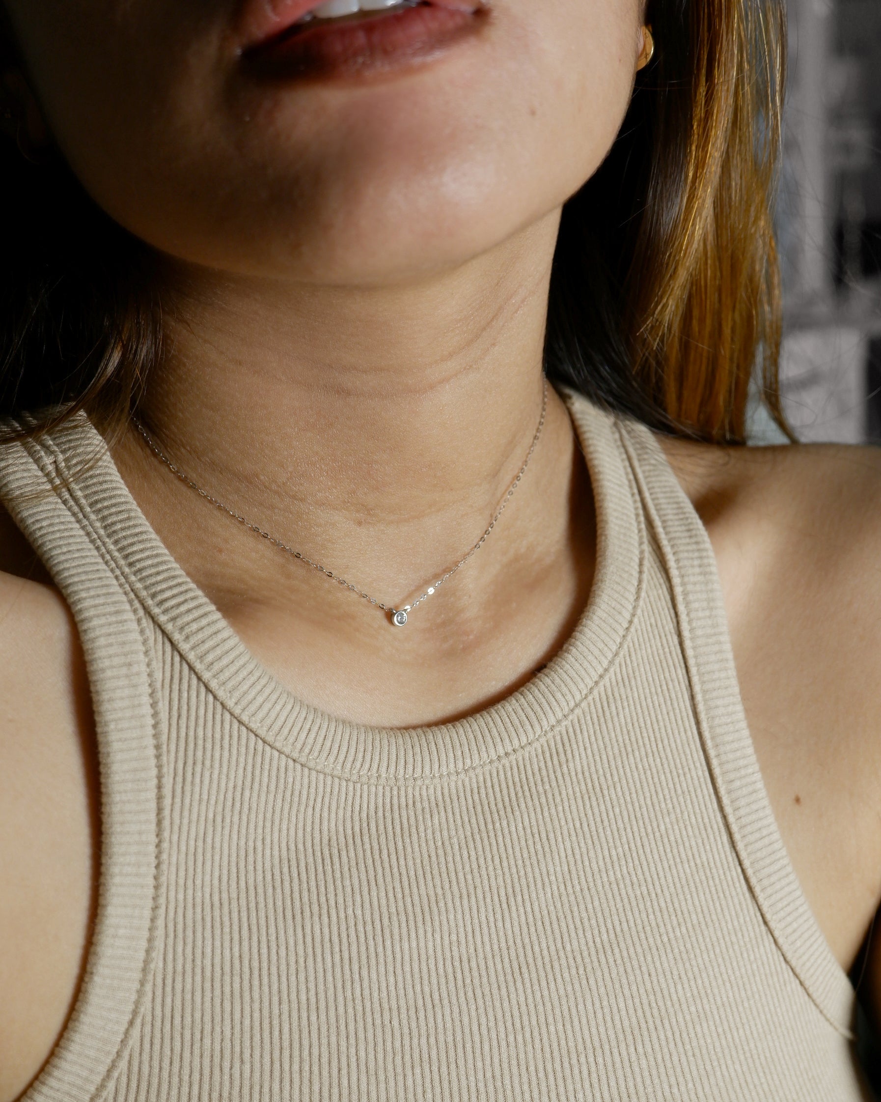 The Tiny Signity Solitaire Necklace in Solid Gold (Rare)