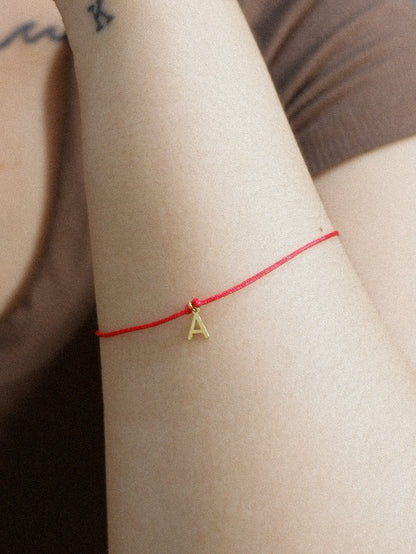 The Red Line Initial Bracelet in Solid Gold