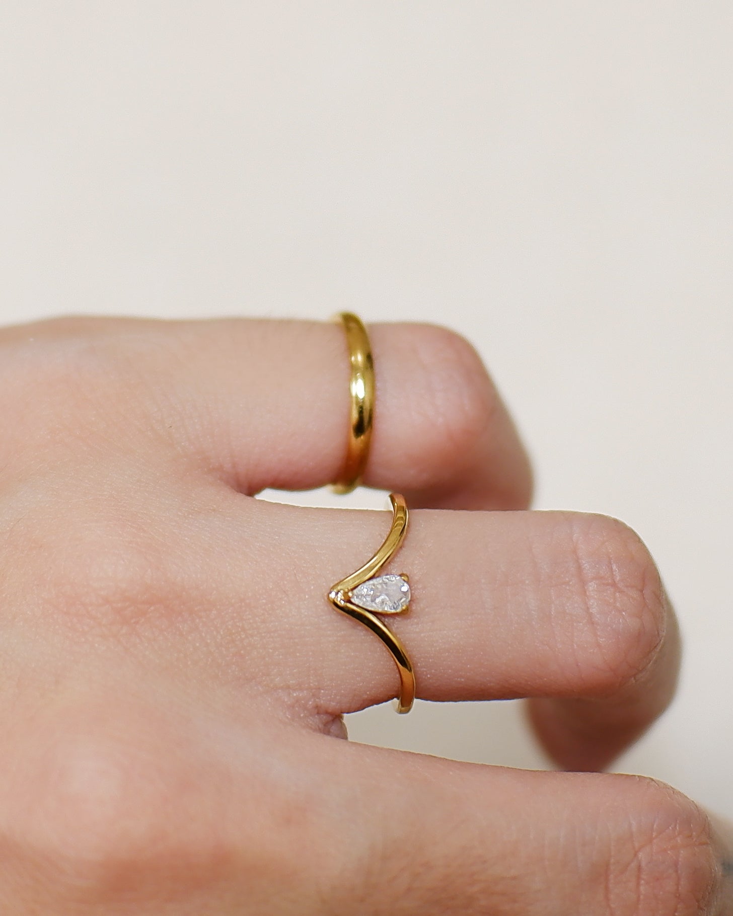The Ava Floating Pear Ring in Solid Gold