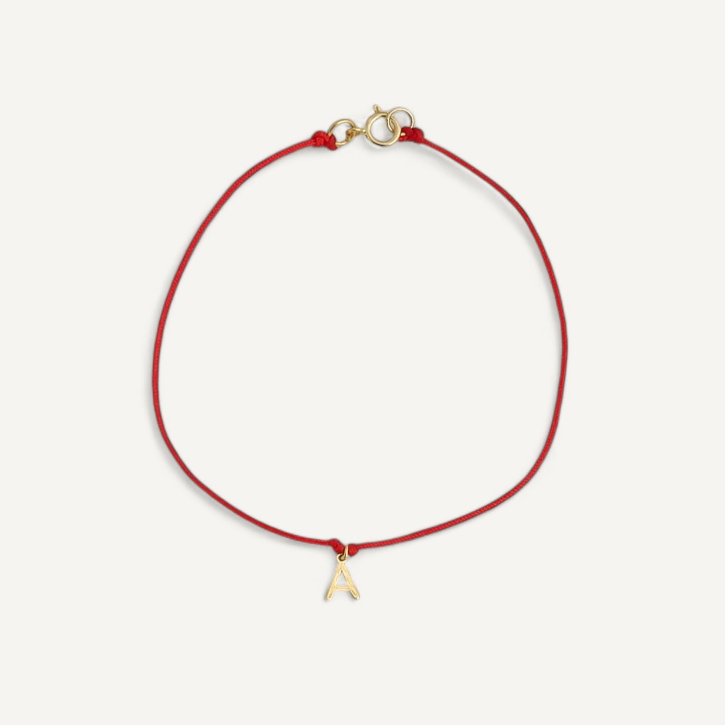 The Red Line Initial Bracelet in Solid Gold