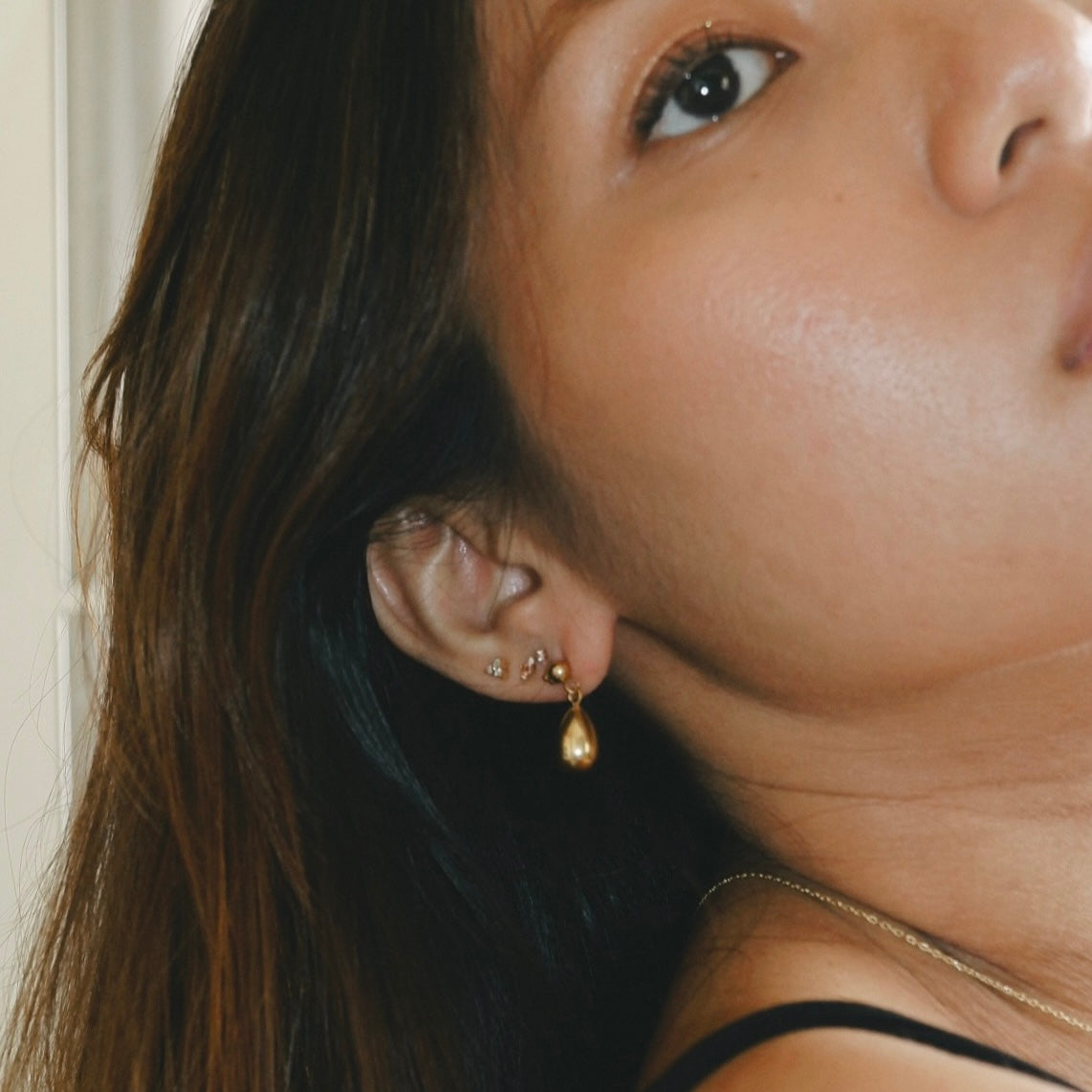 The Tiny Triad Diamond Earrings in Solid Gold
