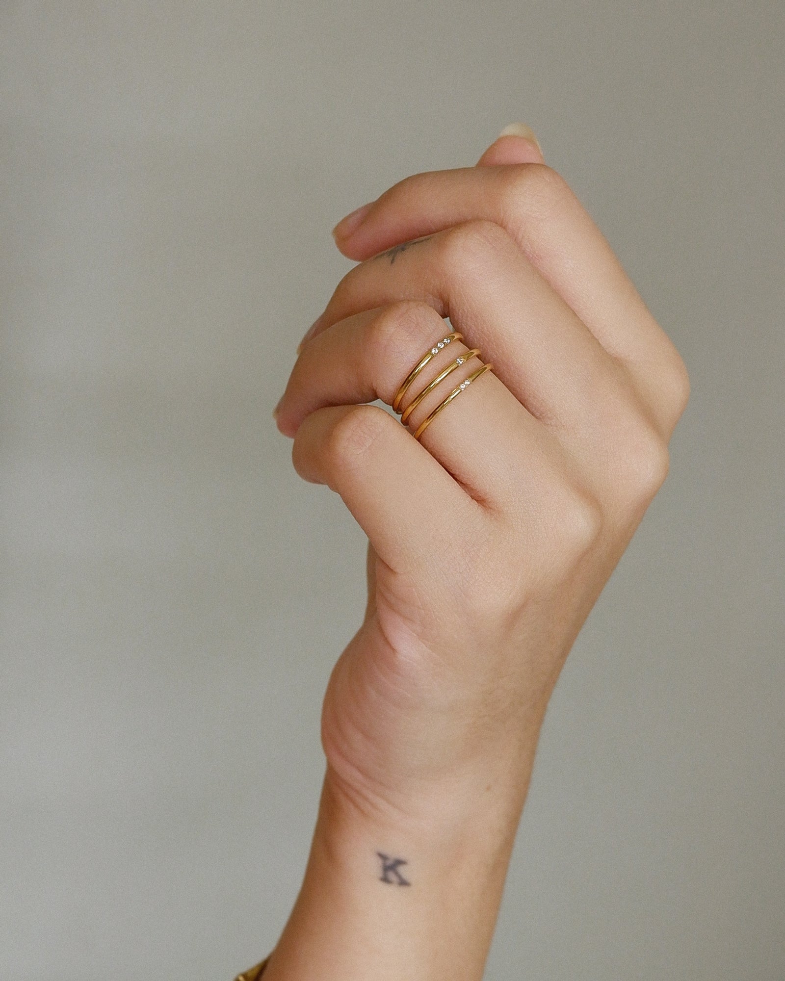 The Birthstone Dotted Skinniest Band in Solid Gold