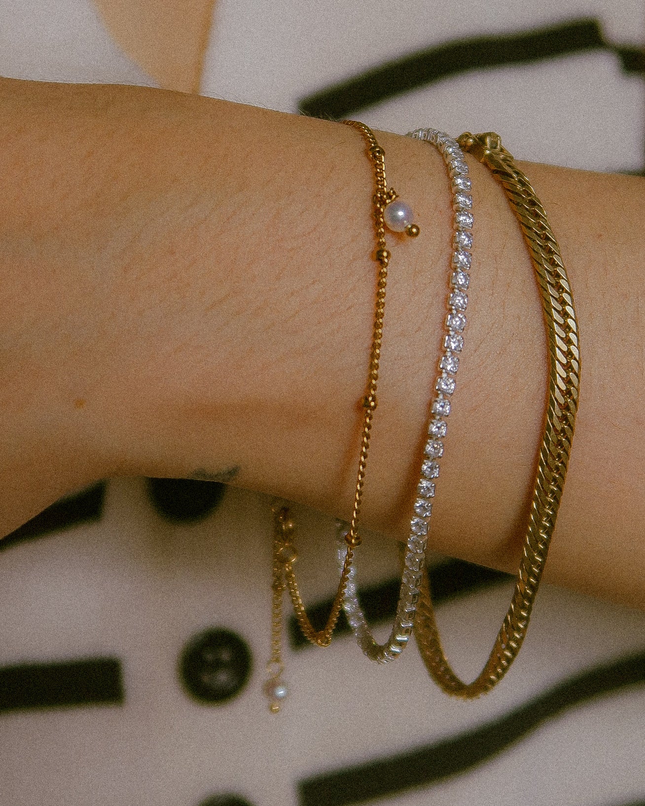 The Dangling Pearl Subtle Ball Bracelet