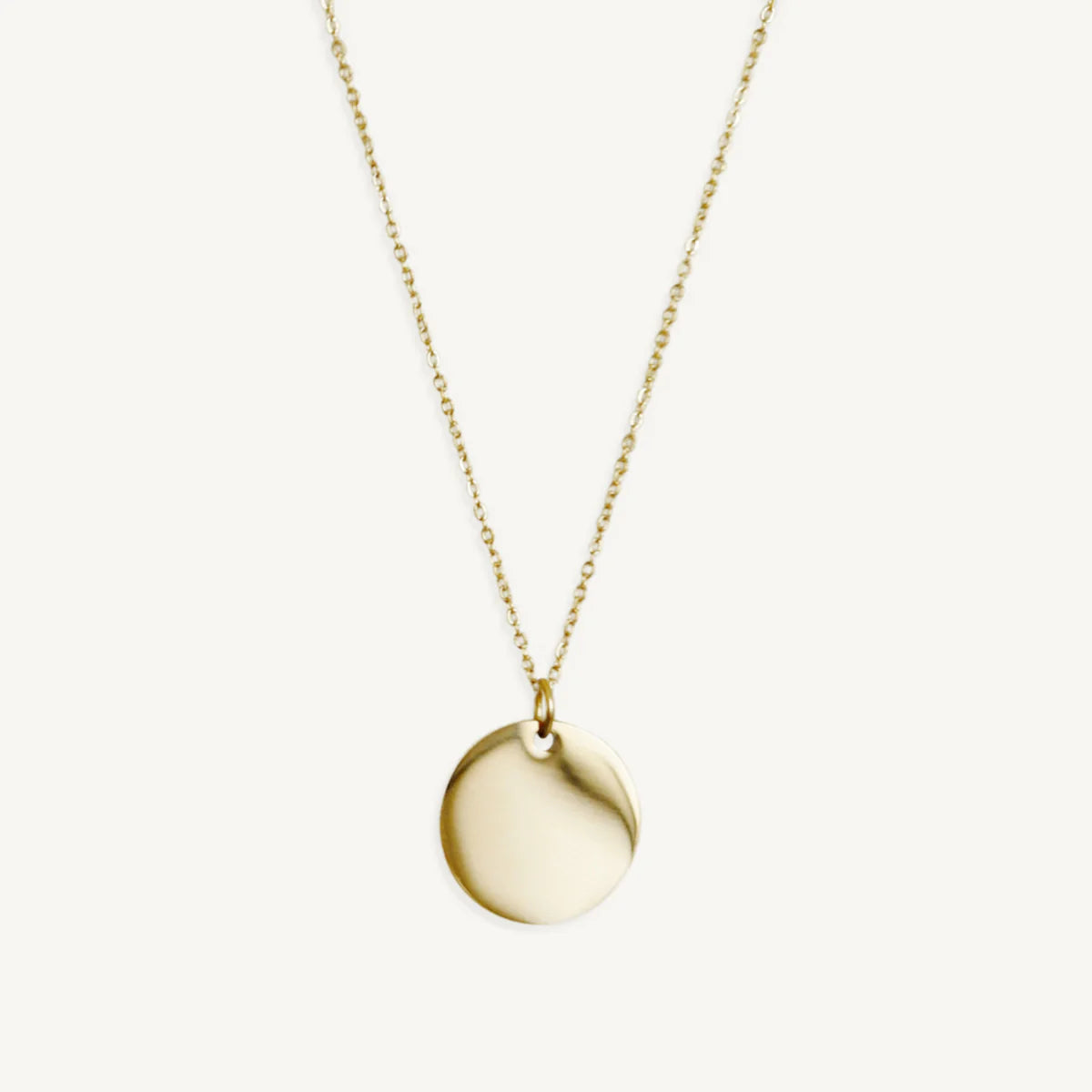 The Tiny Disc Pendant in Solid Gold
