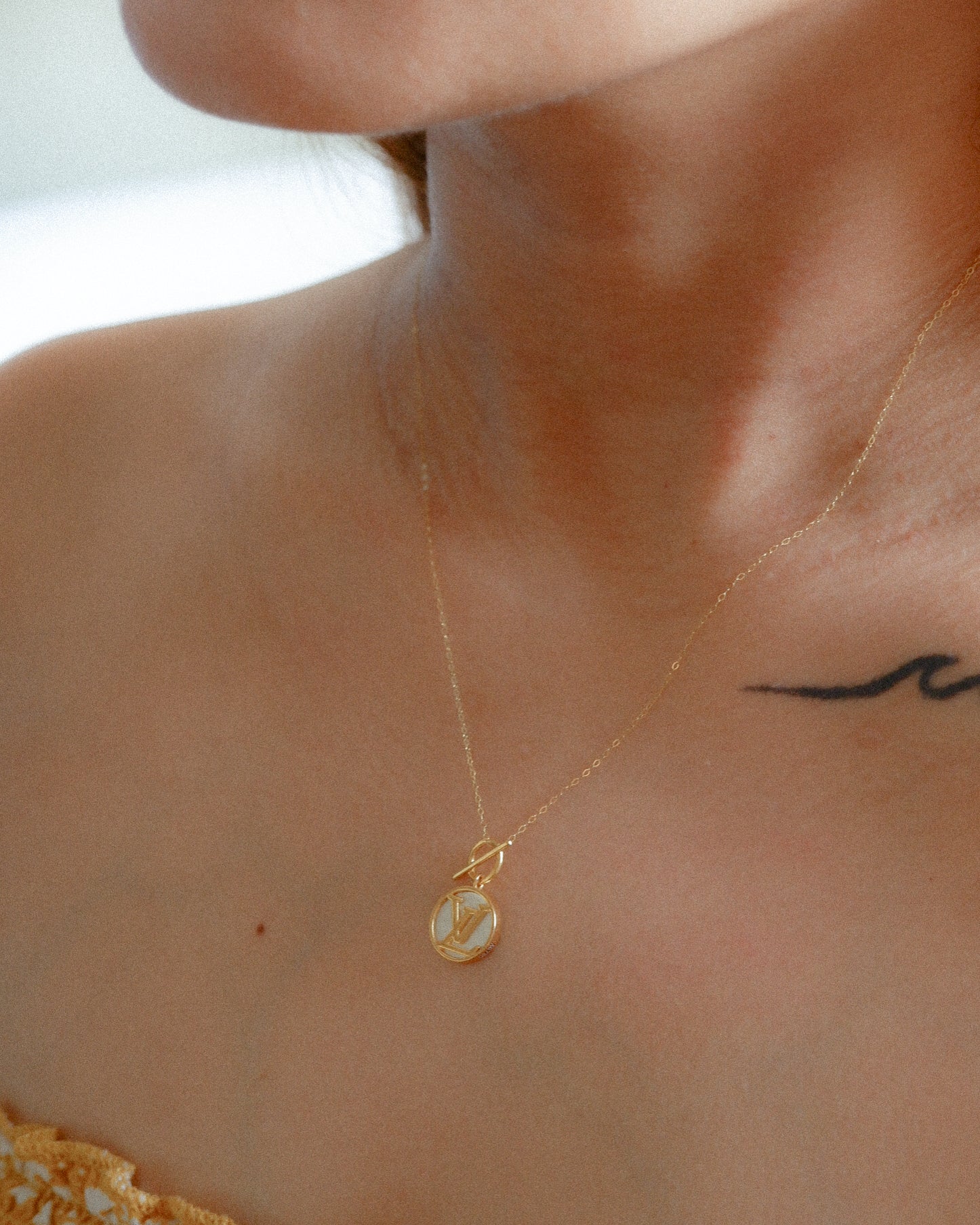 The Designer Disc Necklace in Solid Gold