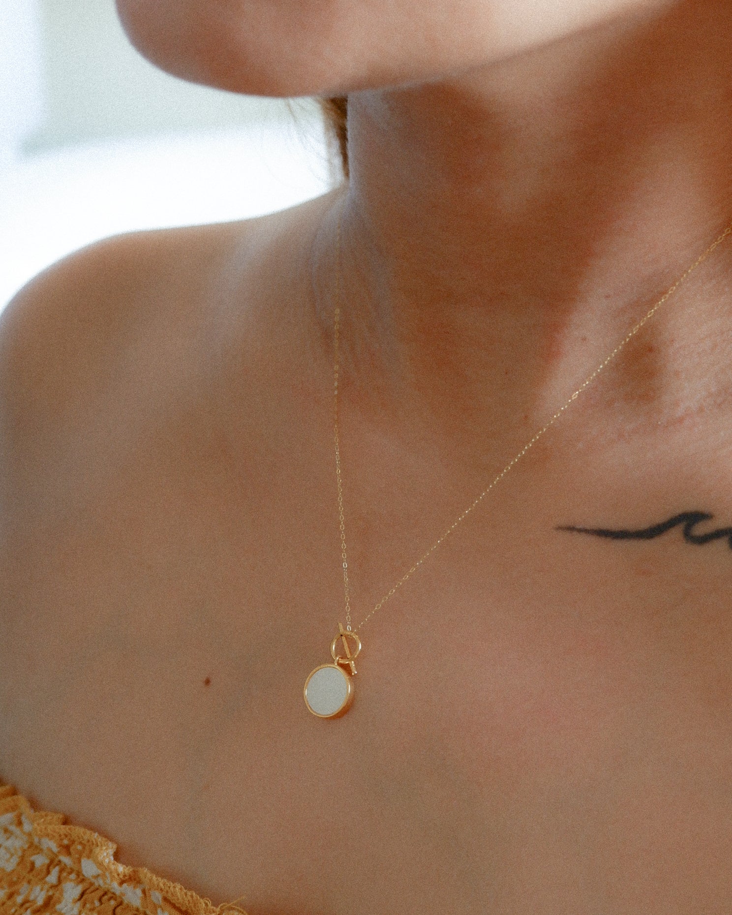 The Designer Disc Necklace in Solid Gold