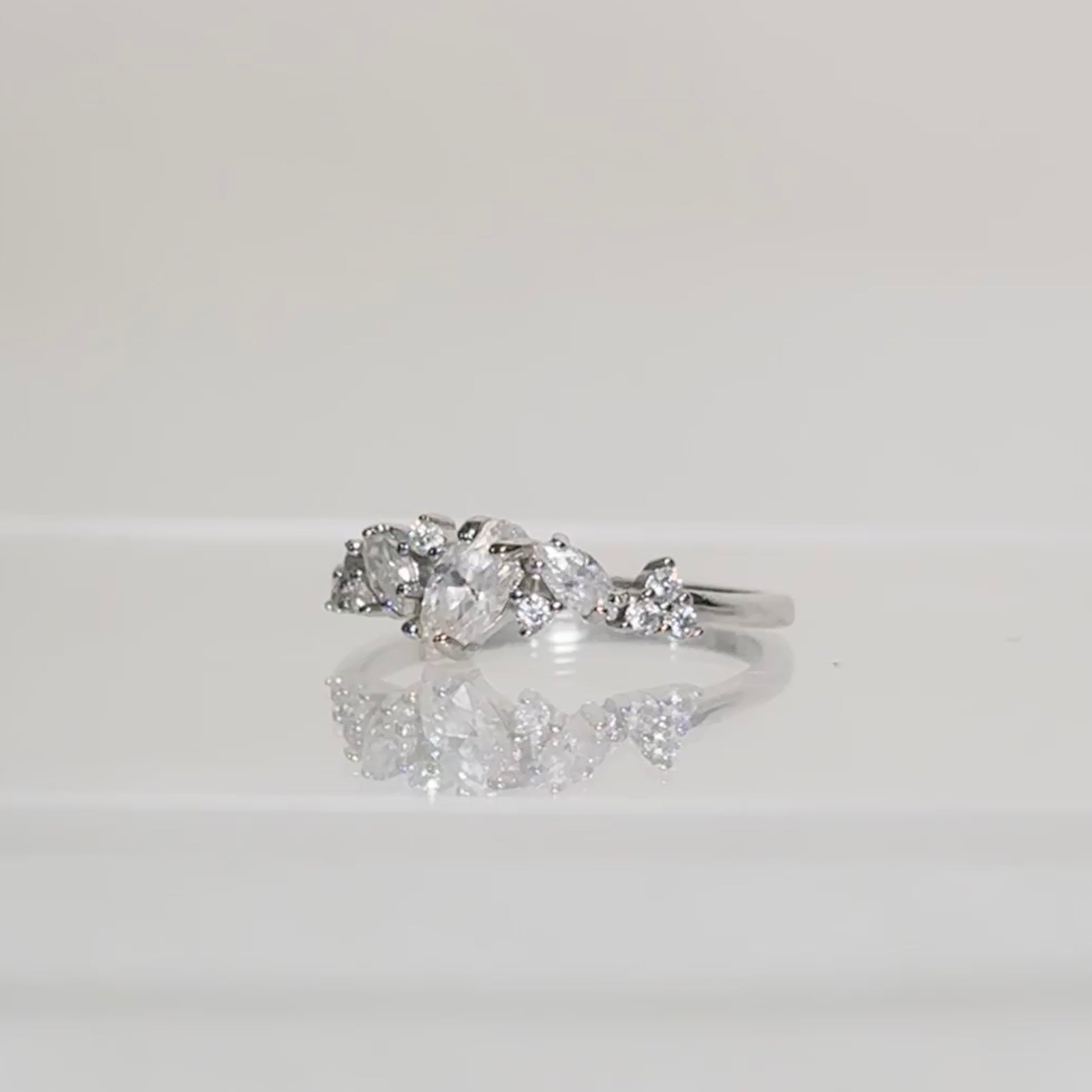 The Aurora Scattered Moissanite Ring