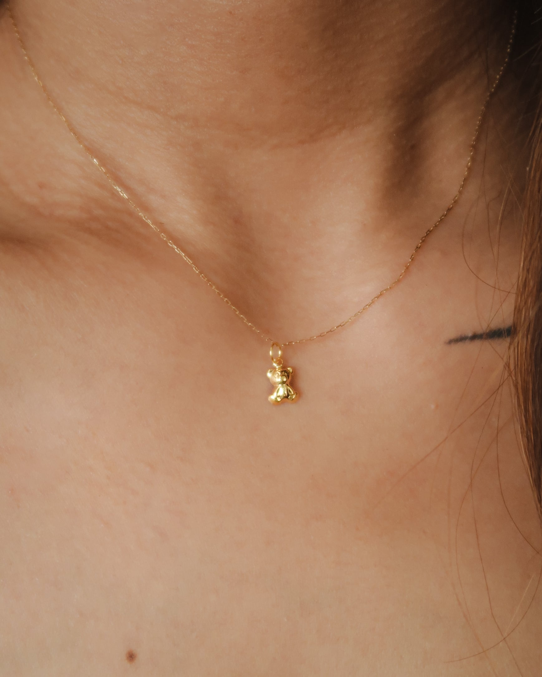 The Tiny Teddy Necklace in Solid Gold
