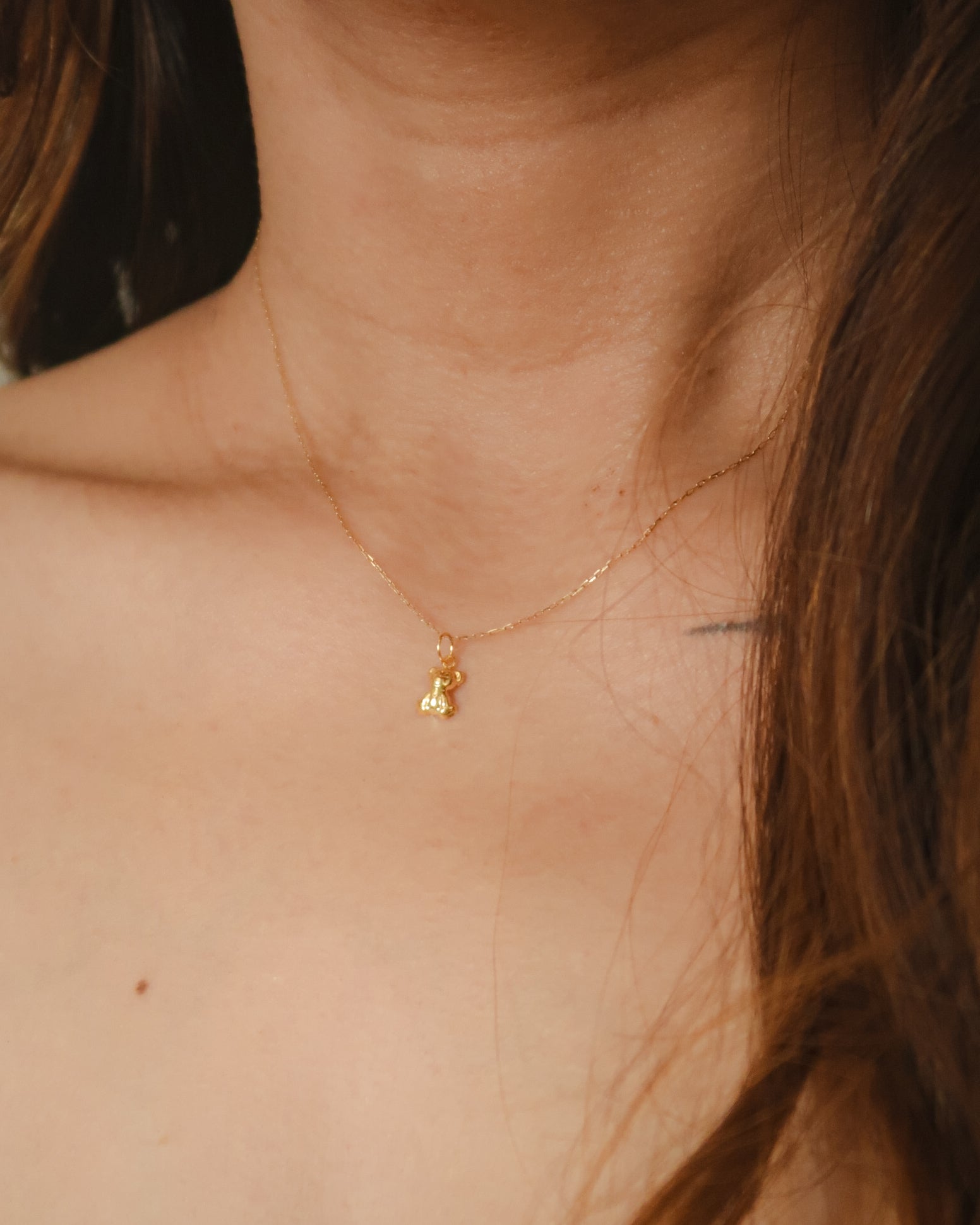 The Tiny Teddy Necklace in Solid Gold