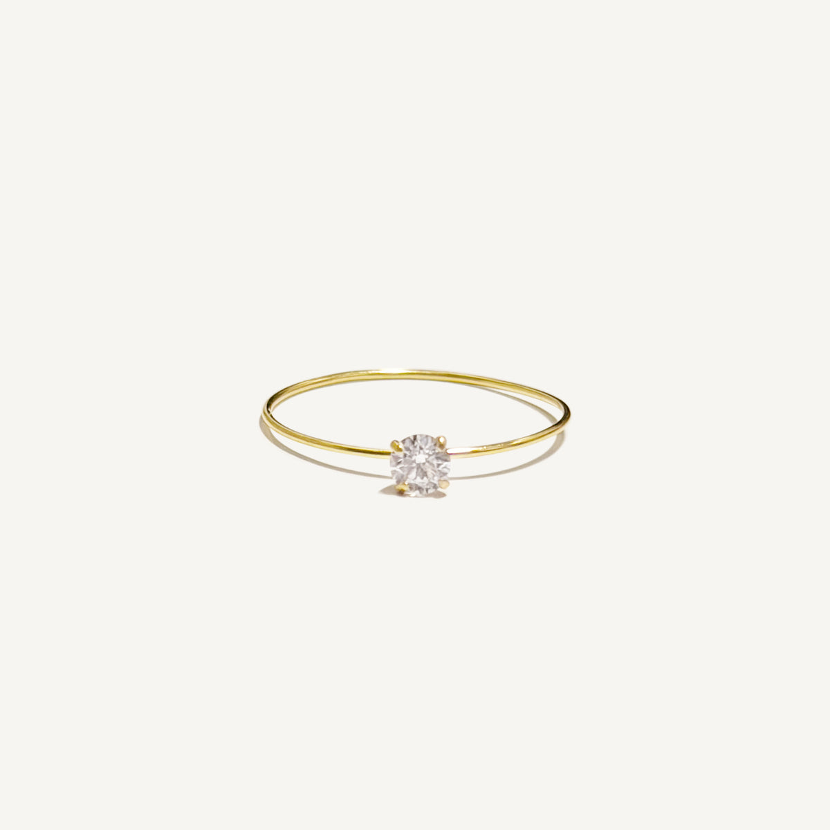The Barely There Solitaire Ring in Solid Gold