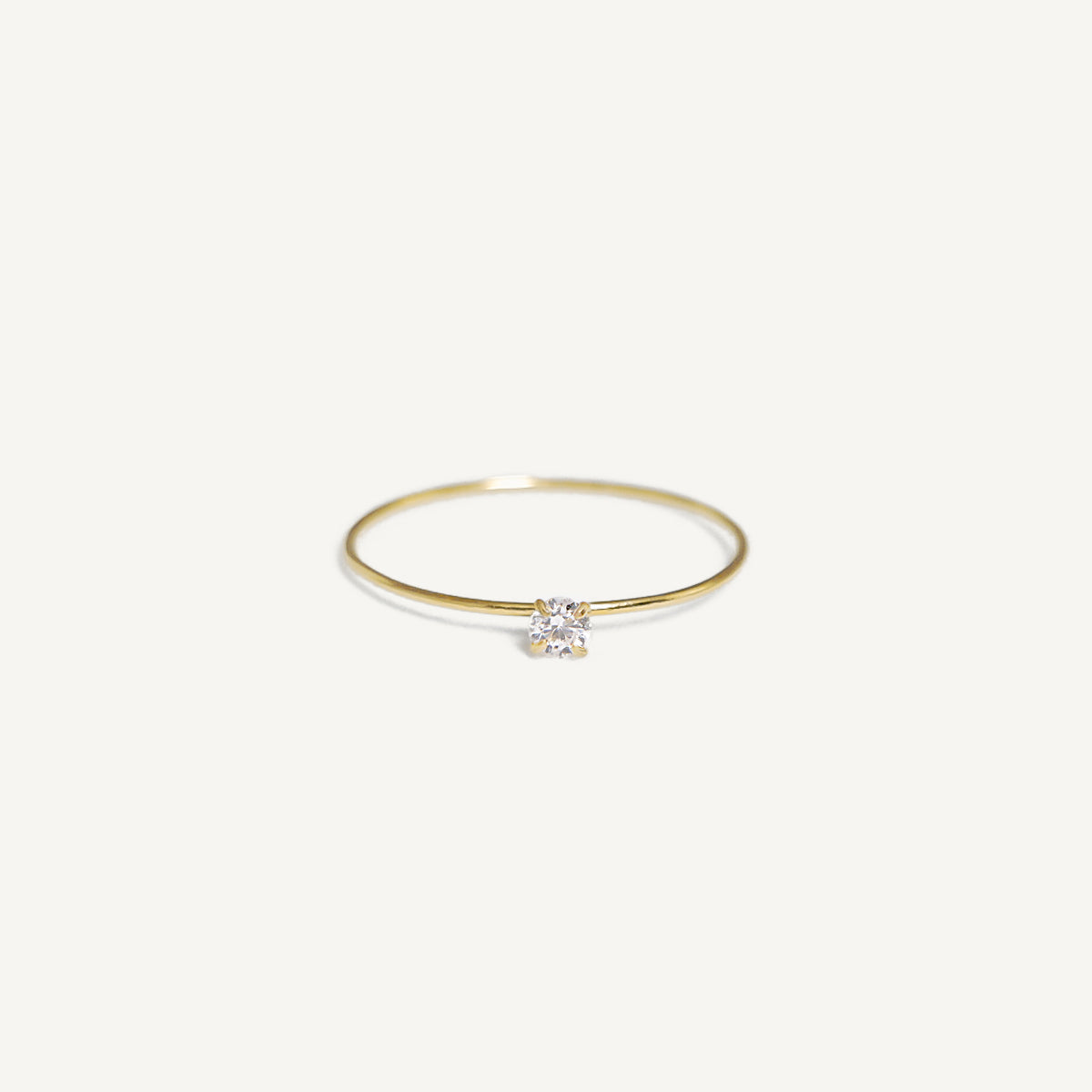 The Barely There Mini Solitaire Ring in Solid Gold