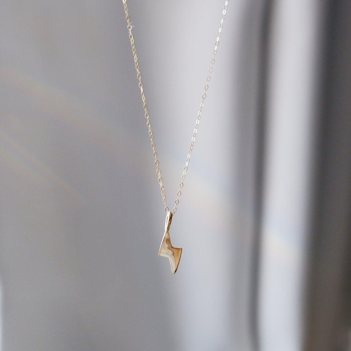 The Lightning Bolt Pendant in Solid Gold