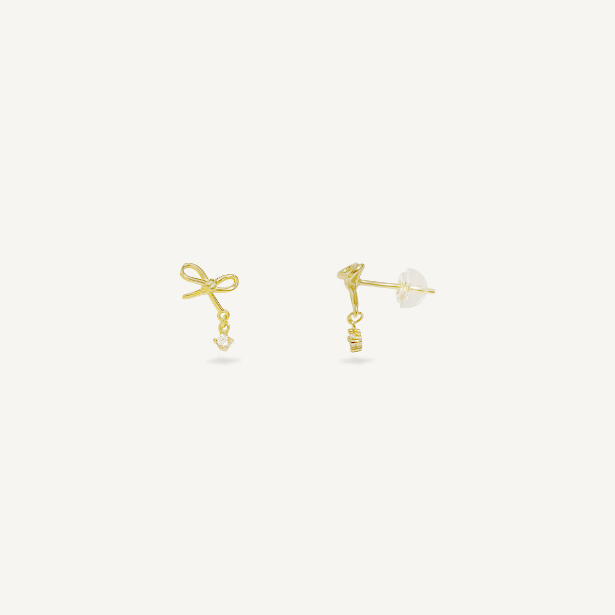 The Dainty Ribbon Dangling Solitaire Earrings