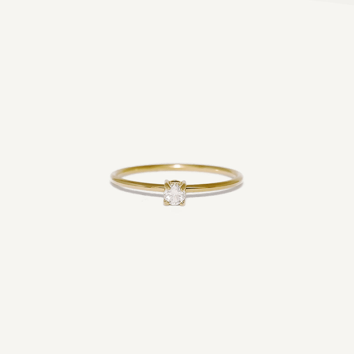 The Dainty Zircon Solitaire Ring