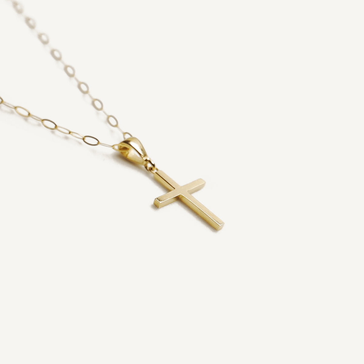 The Statement Cross Pendant in Solid Gold