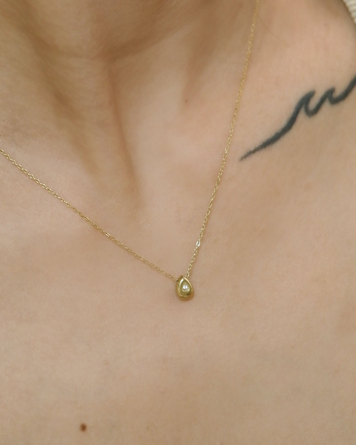 The Tiny Golden Pear Solitaire Necklace