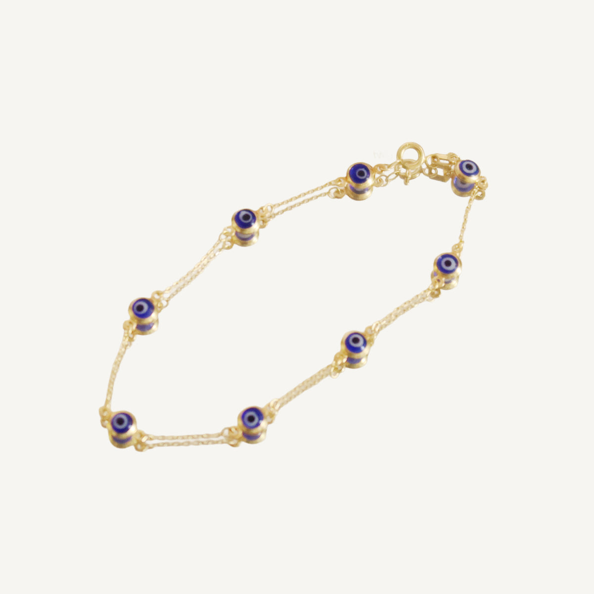 The Evil Eye Station Bracelet in Solid Gold