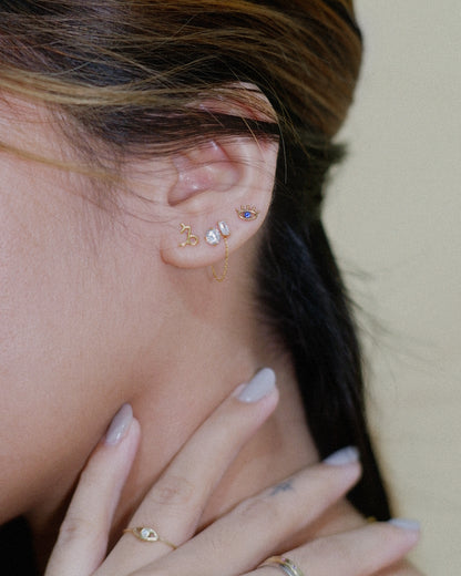 The Mini Zodiac Sign Studs in Solid Gold