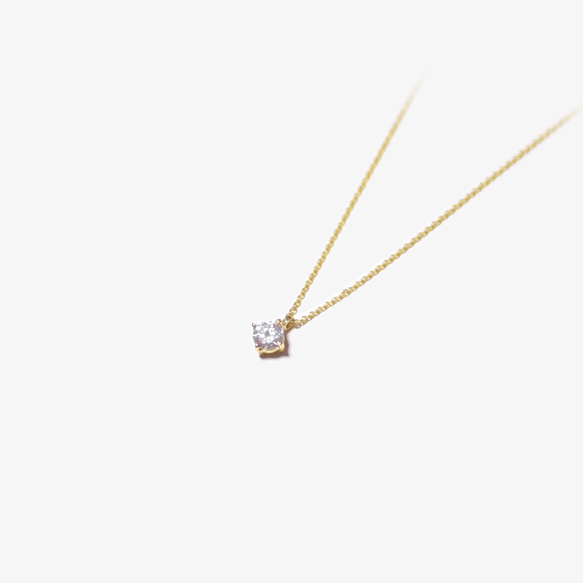 The Elite Floating Moissanite Necklace in Solid Gold