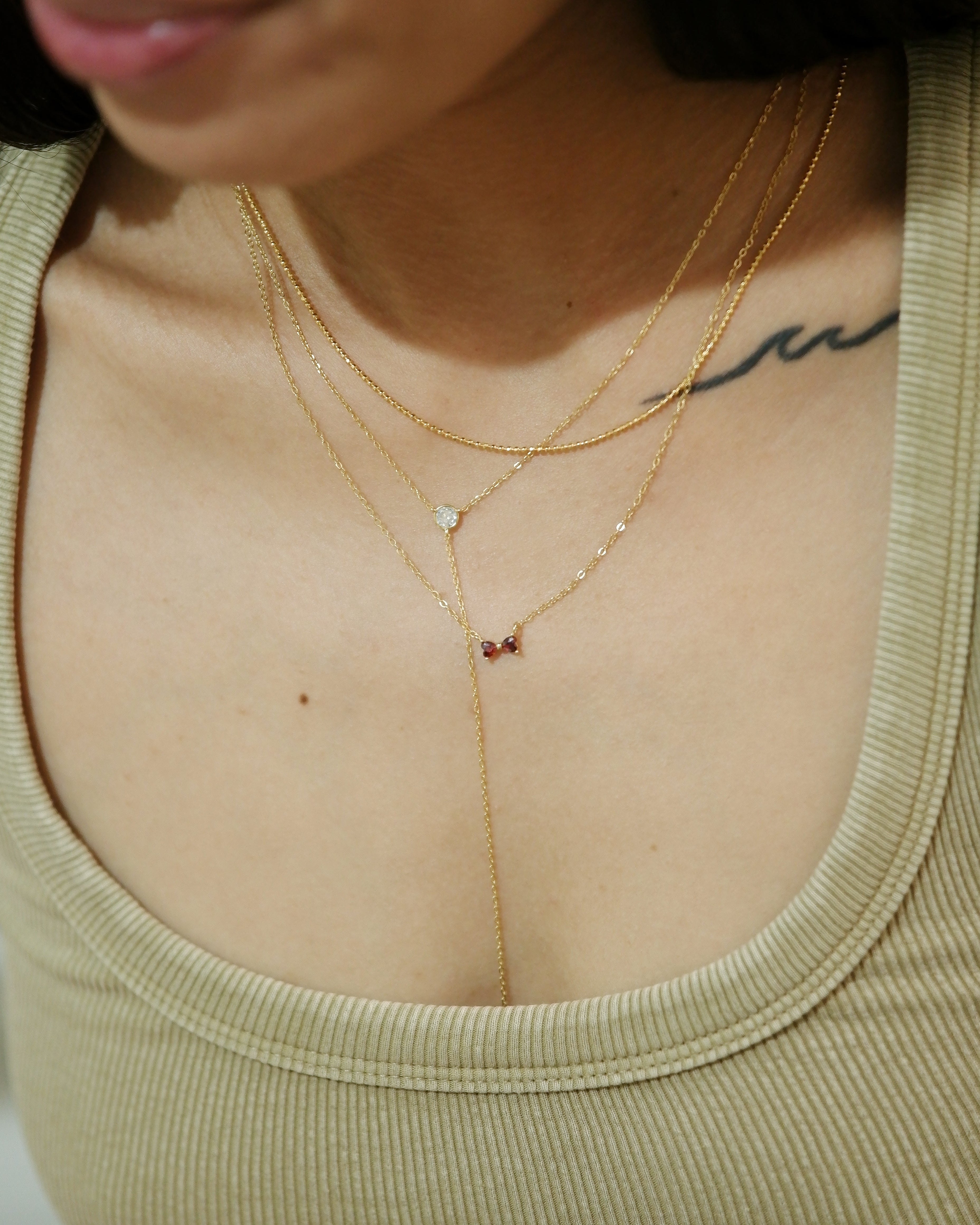 The Mini Garnet Heart Ribbon Necklace