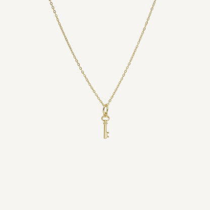 The Mini Key Pendant in Solid Gold