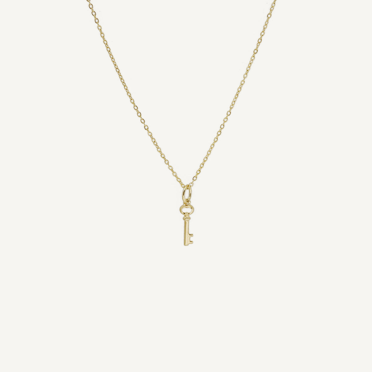 The Mini Key Pendant in Solid Gold