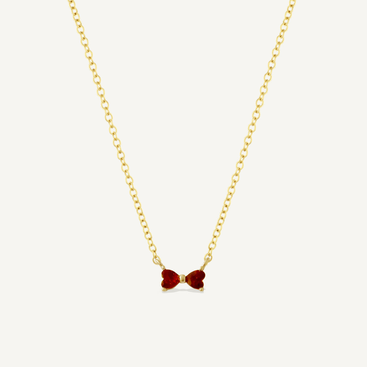 The Mini Garnet Heart Ribbon Necklace