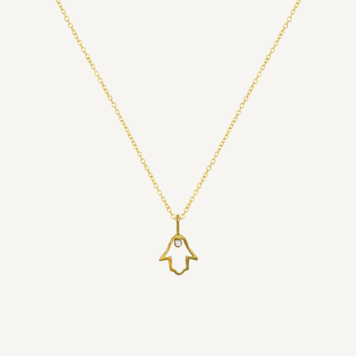 The Hamsa Floating Solitaire Charm in Solid Gold