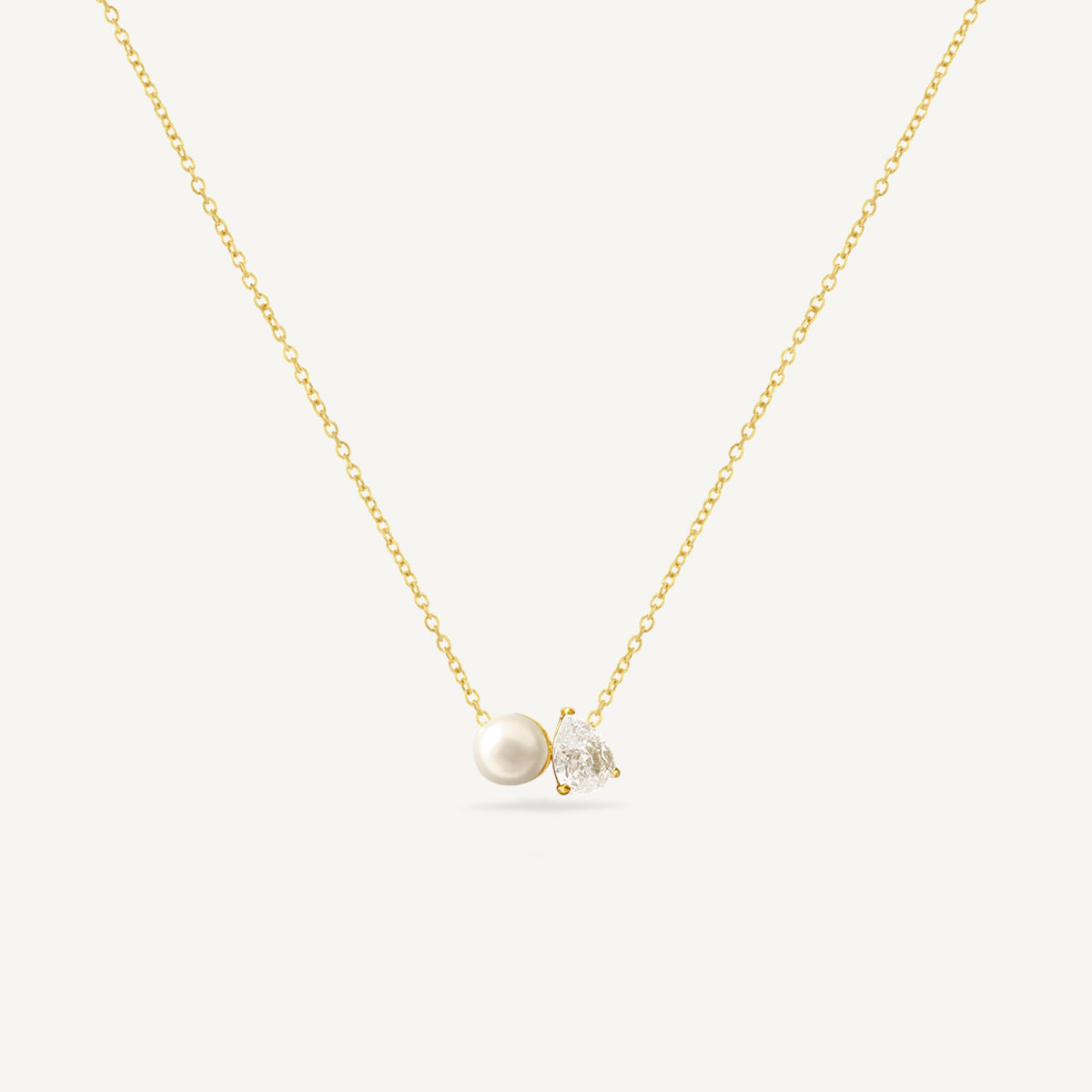 The Signature Floating Pear and Pearl Birthstone Necklace