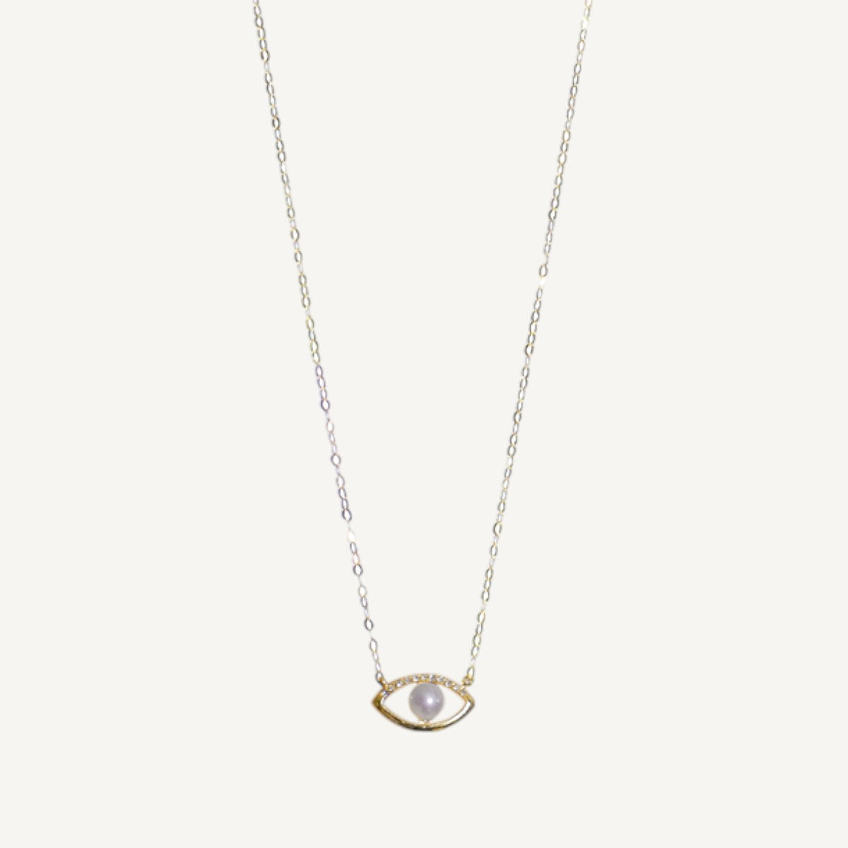 The Pearl Evil Eye Diamond Necklace in Solid Gold