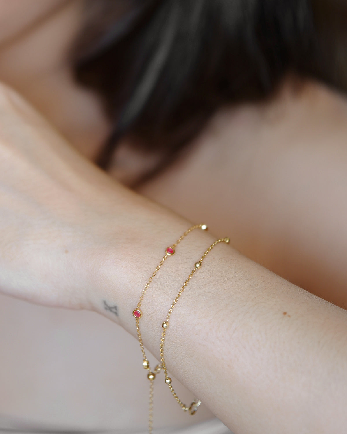 The Mini Ruby Solitaire Station Bracelet