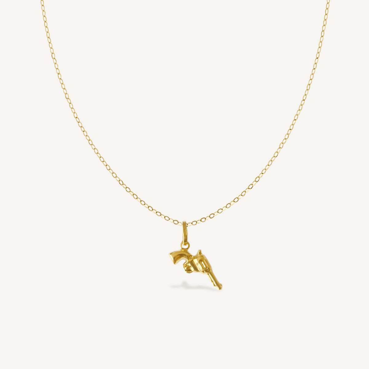 The Pistol Necklace in Solid Gold