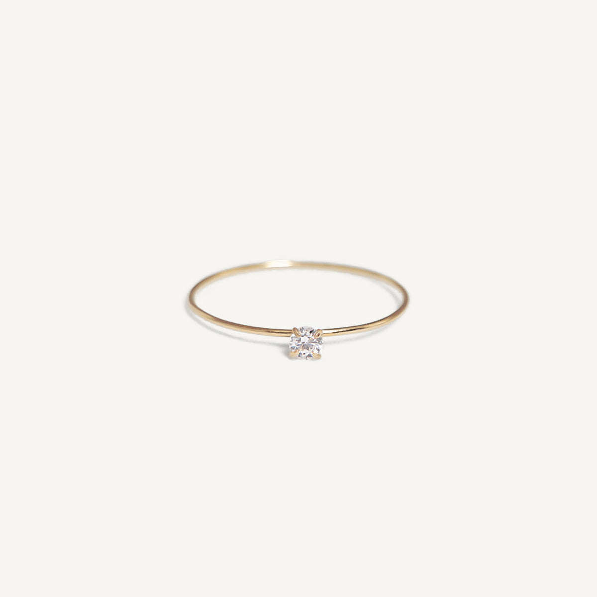 The Barely There Mini Solitaire Ring in Solid Gold