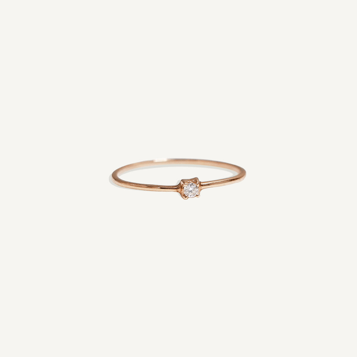 The Tiny Diamond Ring in Solid Gold