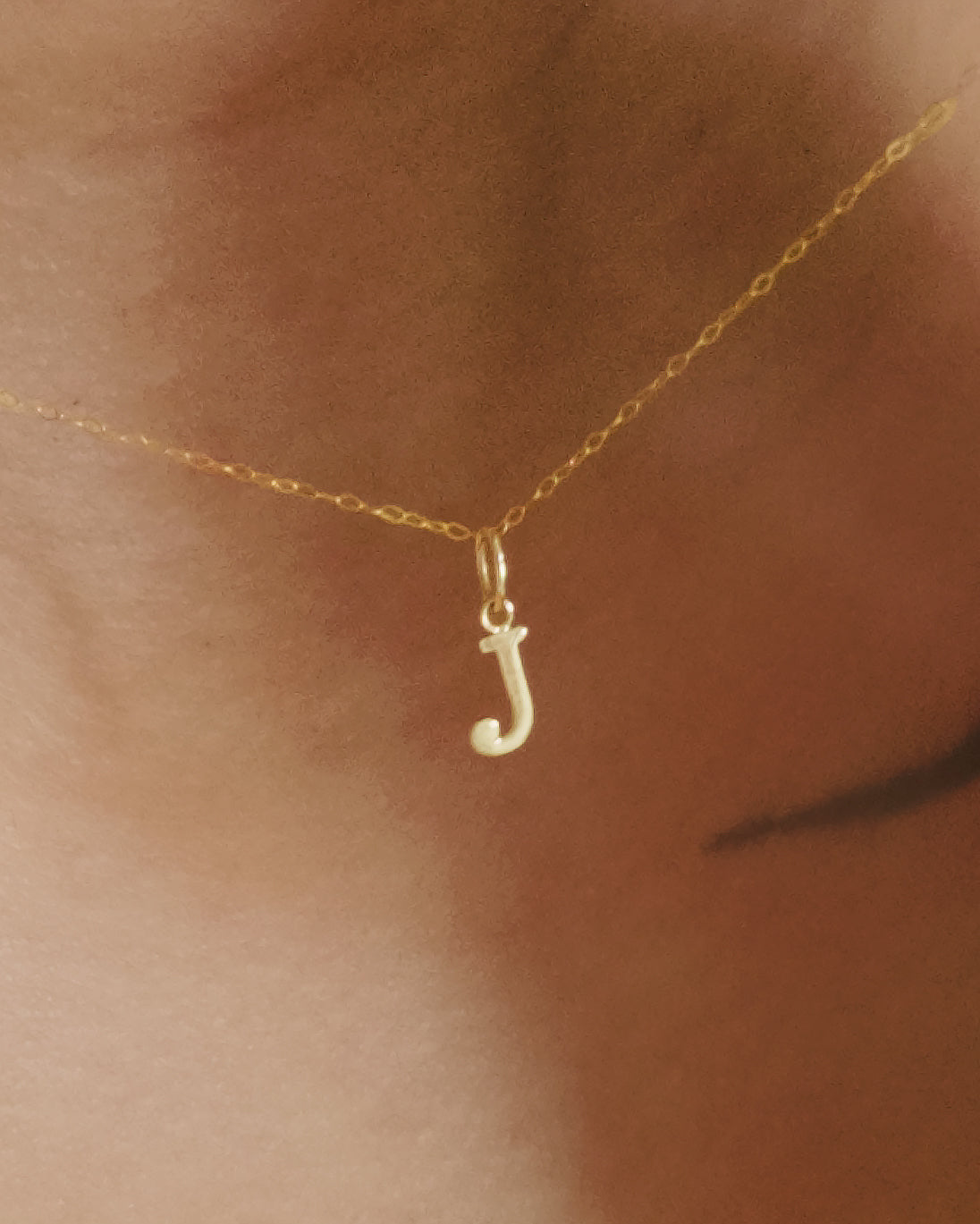 The Tiny Floating Initial Necklace in Solid Gold