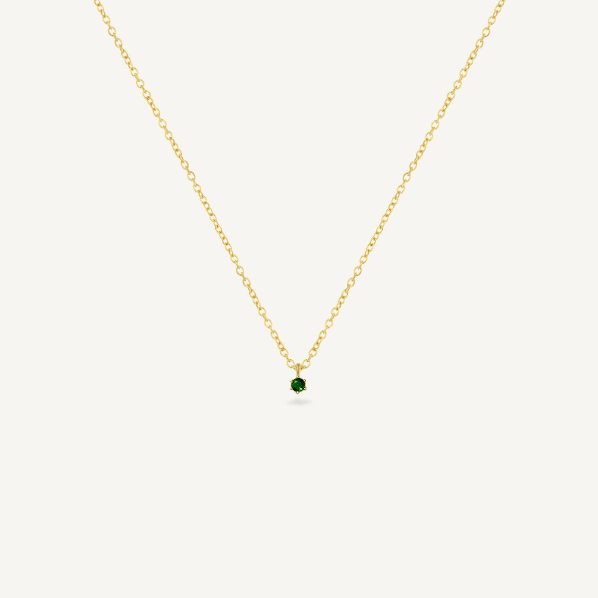The Ultra Tiny Emerald Solitaire Necklace