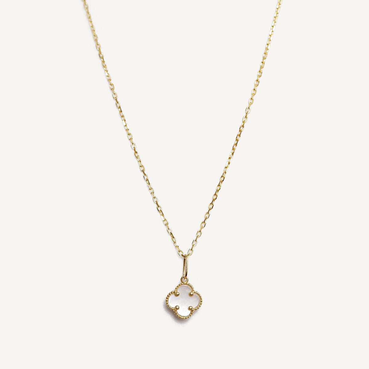 The Ultra Mini Designer Clover Necklace in Solid Gold
