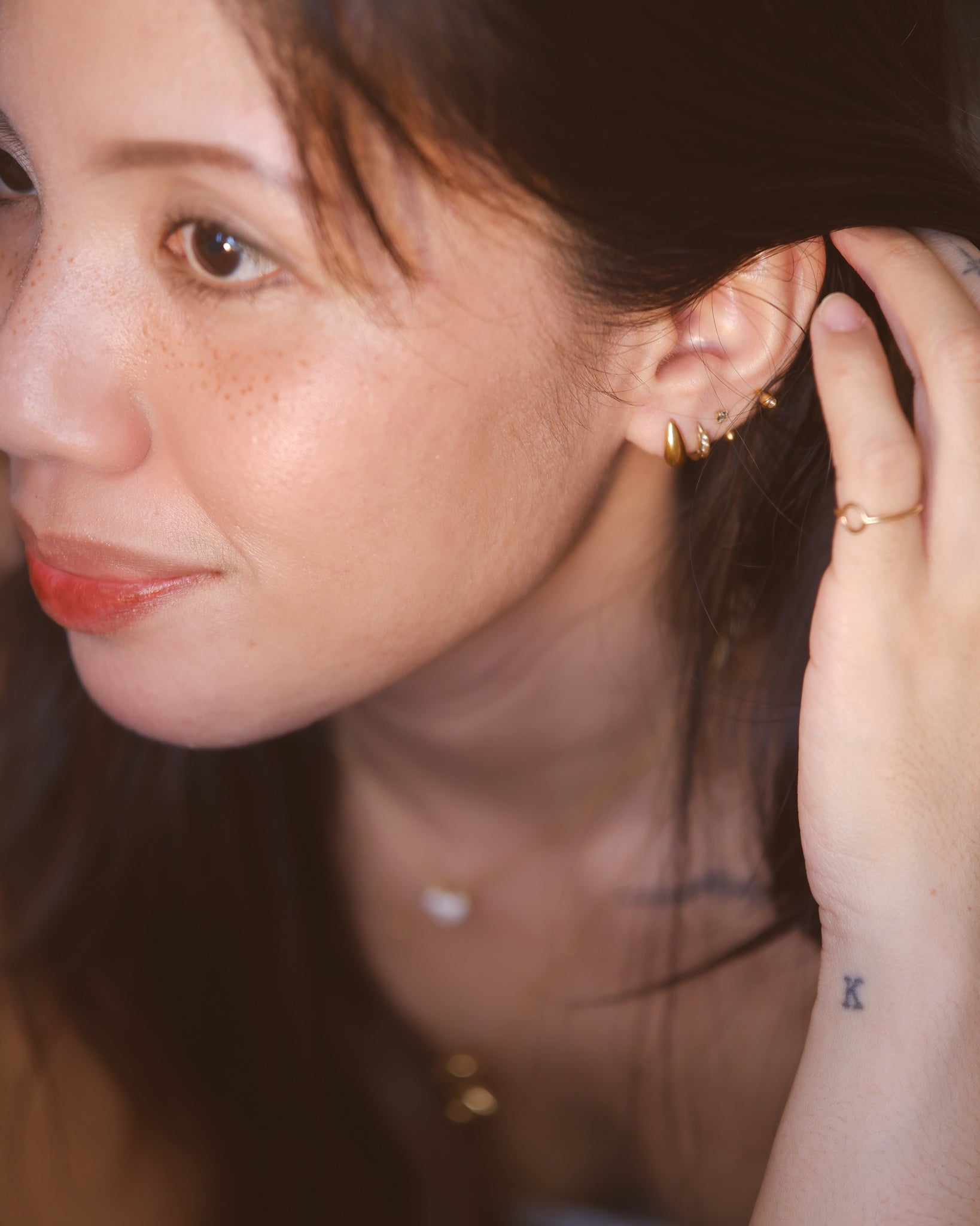 The Signature Water Drop Huggie Earrings