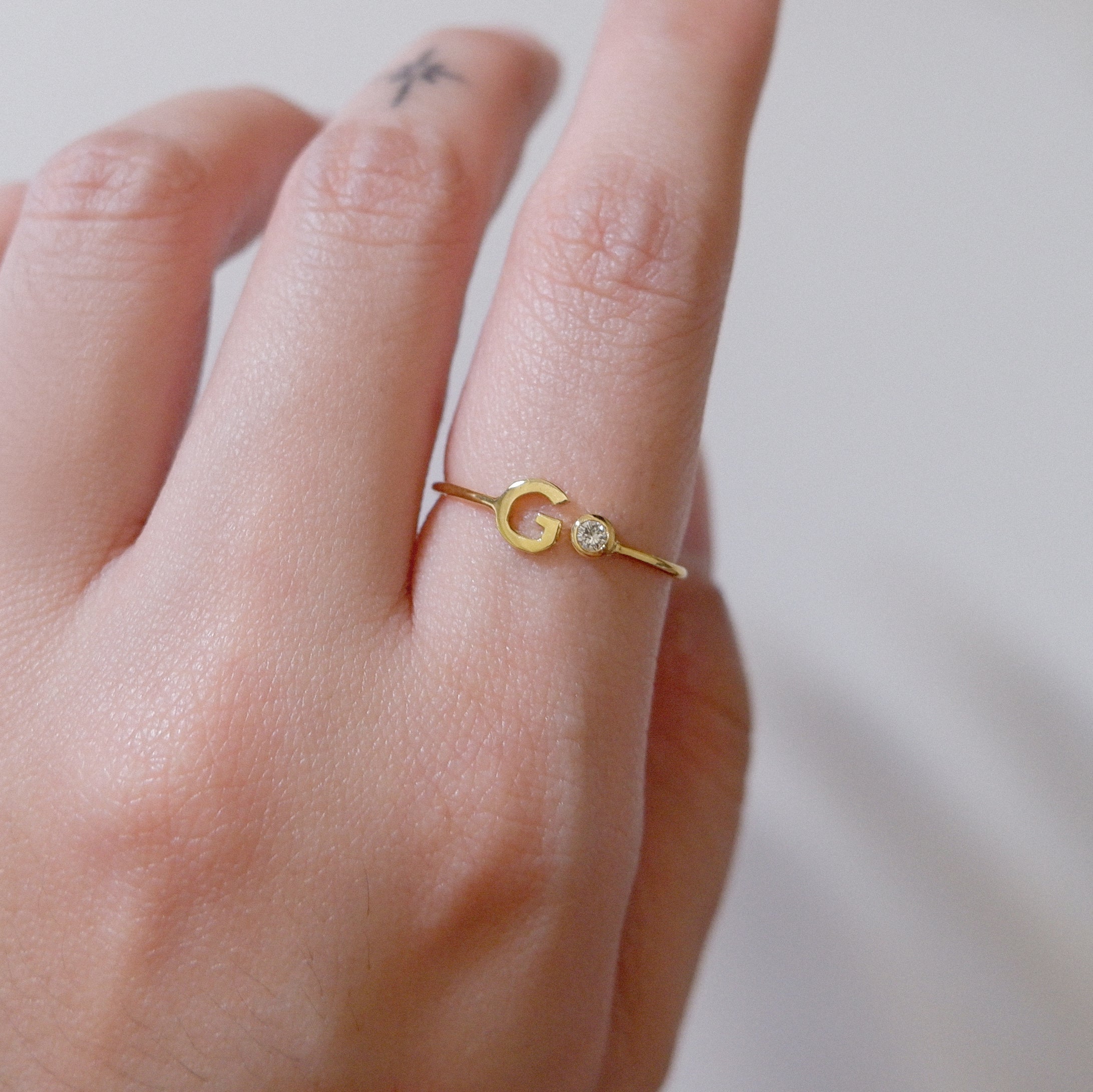 The Birthstone Initial Ring in Solid Gold