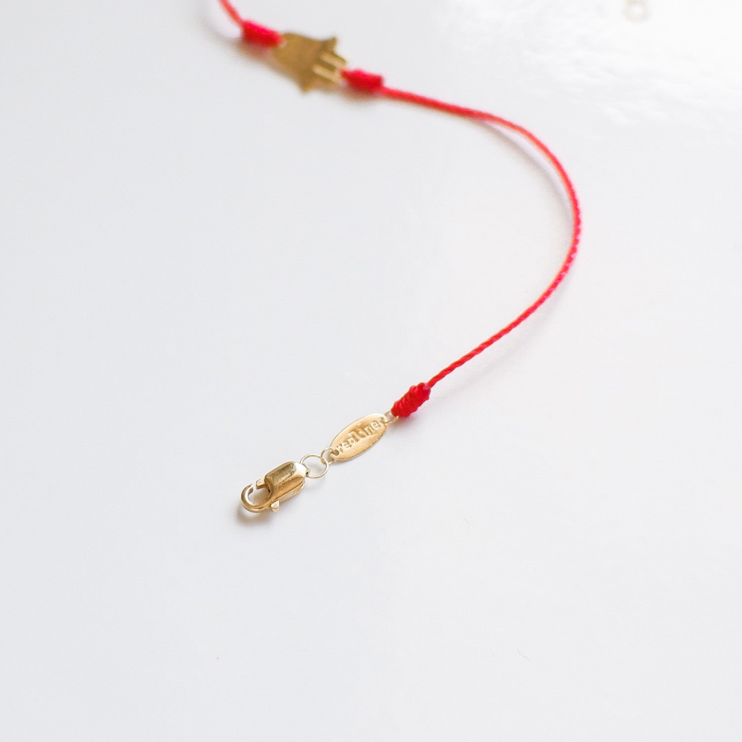 The Red Line Hamsa Bracelet in Solid Gold