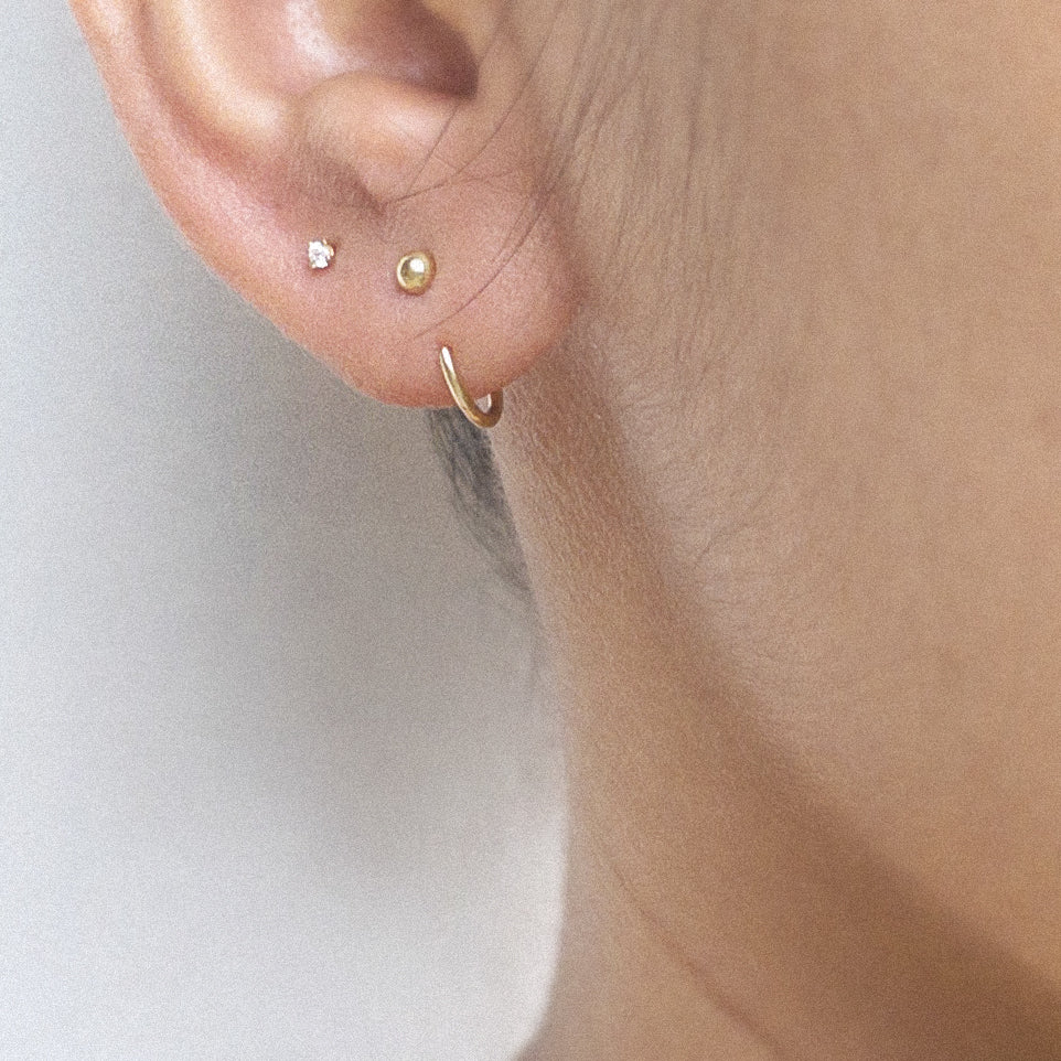 The Ultra Tiny Solitaire Earrings in Solid Gold