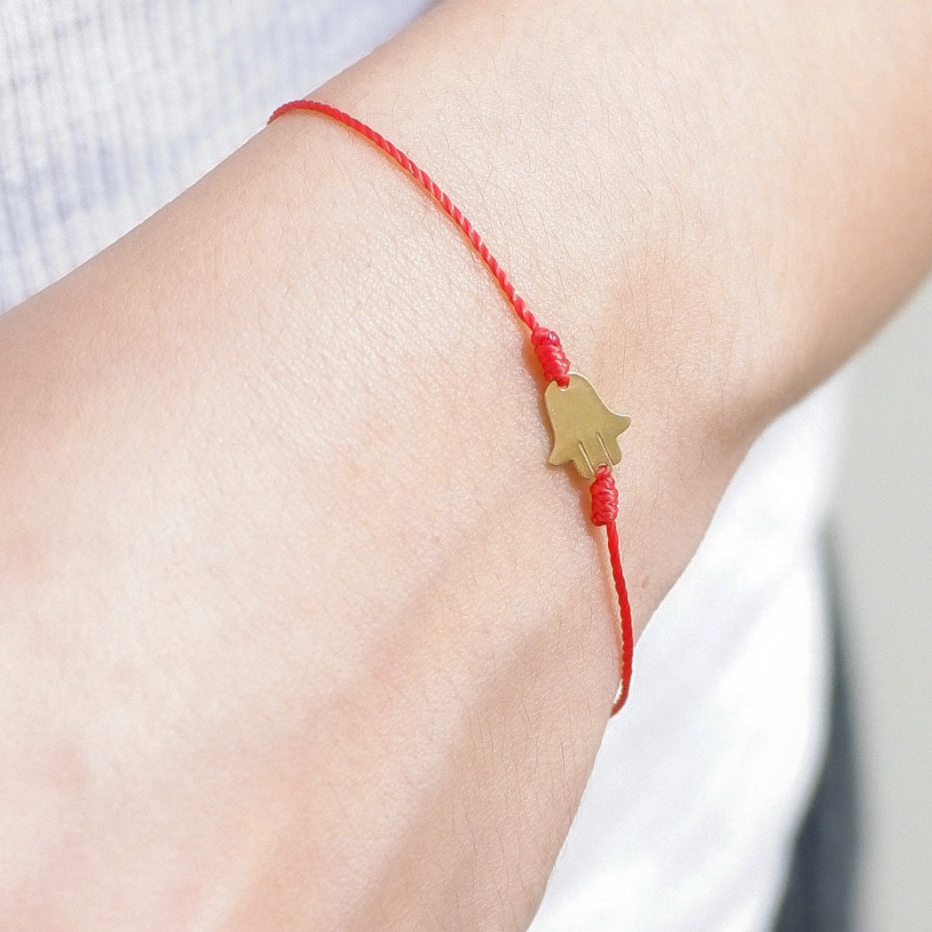 The Red Line Hamsa Bracelet in Solid Gold