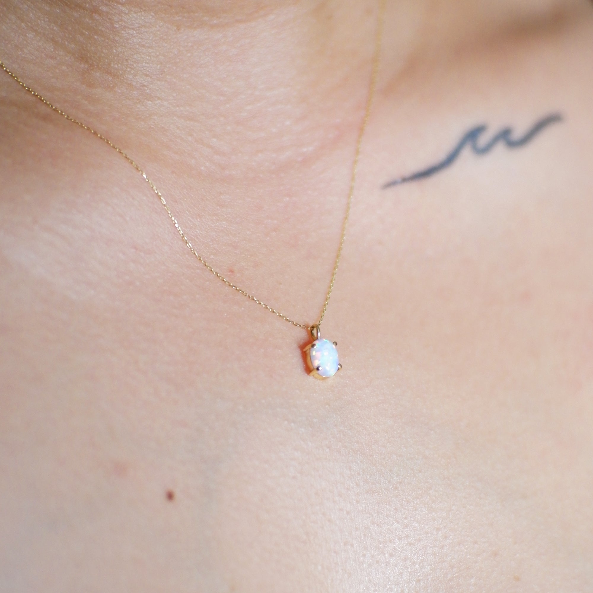 The Oval Birthstone Pendant in Solid Gold