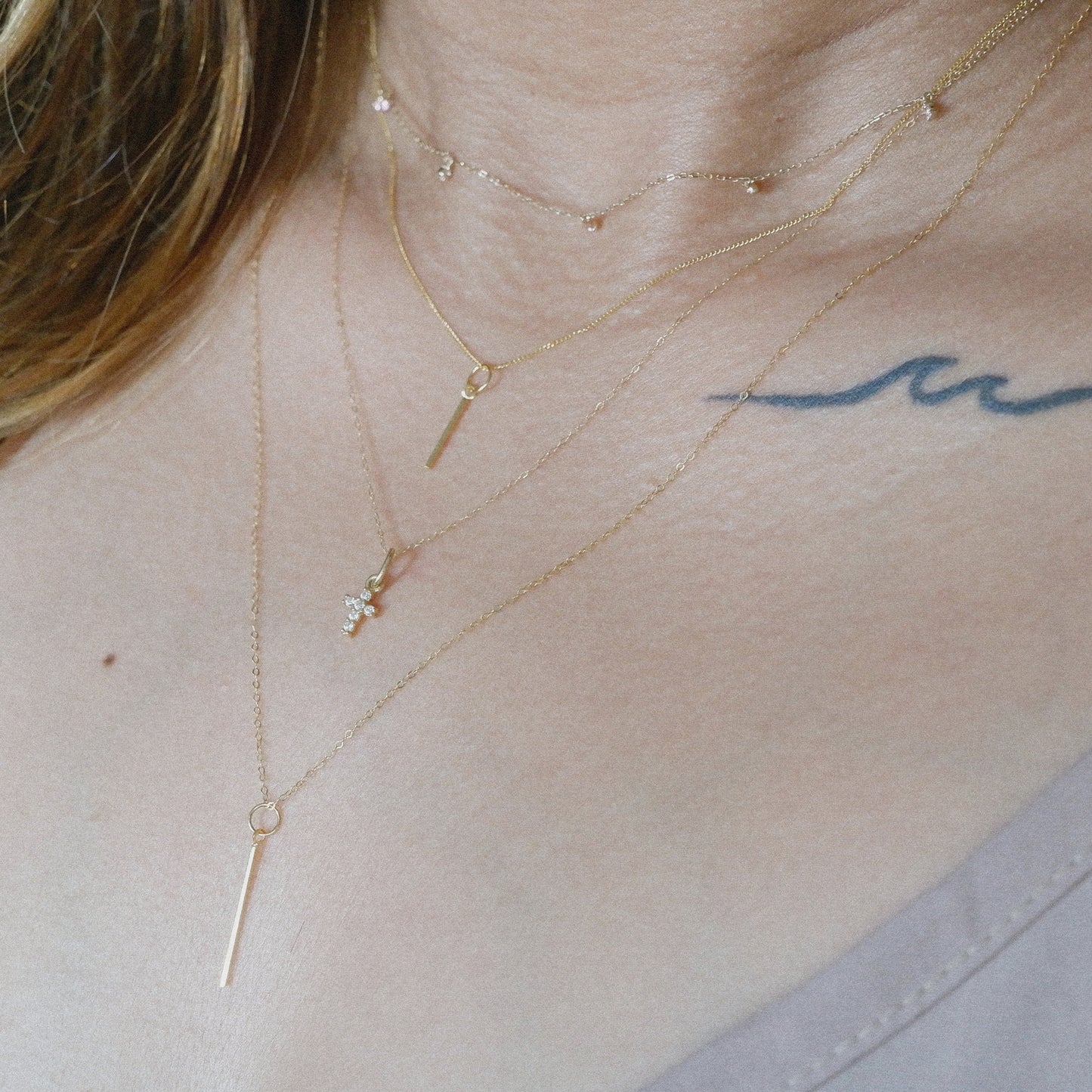 The Tiny Pavé Cross Necklace in Solid Gold